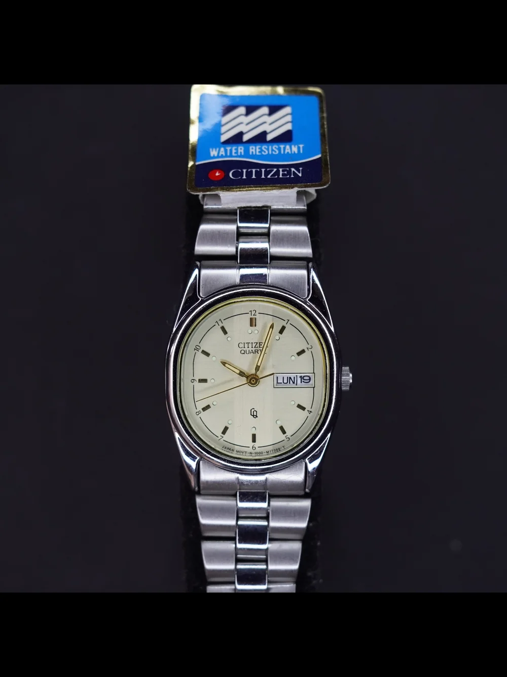 Vintage Citizen Quartz 1000-B00319 Day Date Champagne Dial Stainless Steel NOS